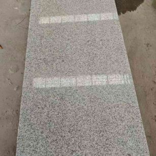 甘肃芝麻白光面毛板