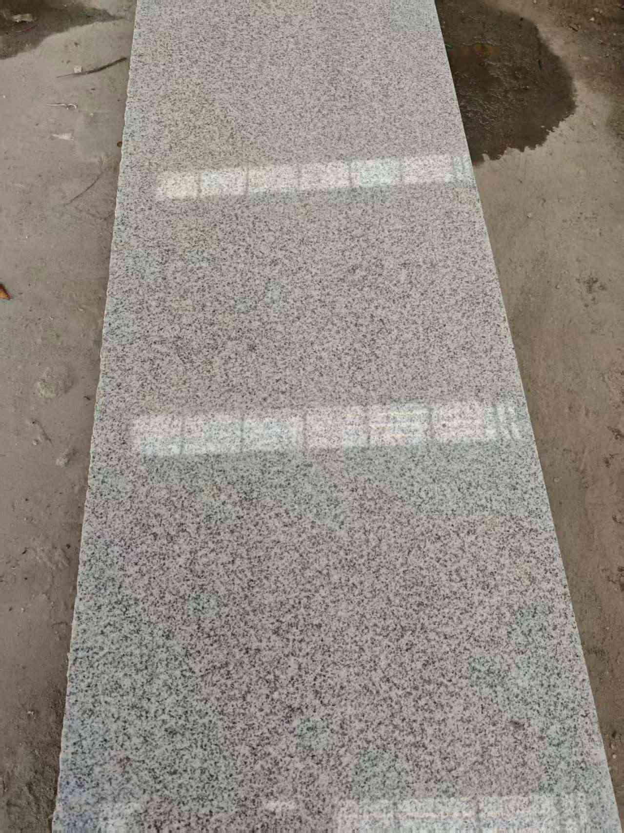 甘肃芝麻白光面毛板